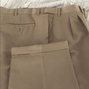 44x30 khaki dress pants. Pleated front.